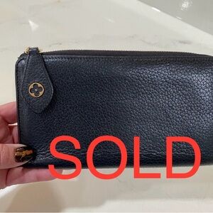 ****SOLD****Authentic Louis Vuitton Leather Zippy 
Long Wallet Black/Hot Pink